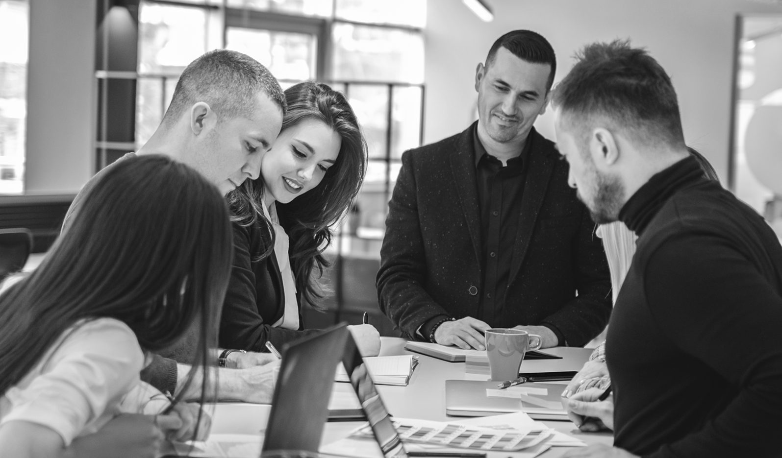 The n3 Group team working together around a table